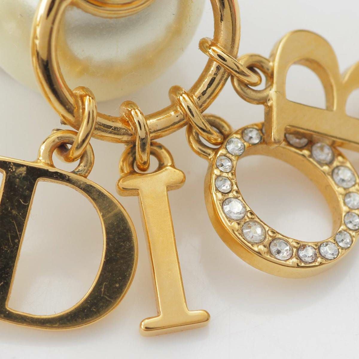 ディオール DIOR トライバル パール ロゴ ラインストーン ピアス